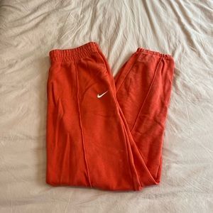 Orange Nike sweats